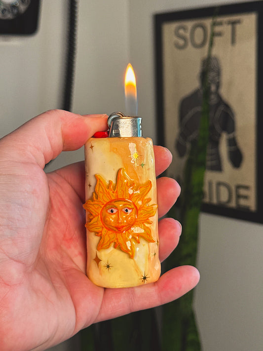 Miss Sunny Celestial Lighter Case – Handcrafted Moon Face Art Lighter Cover