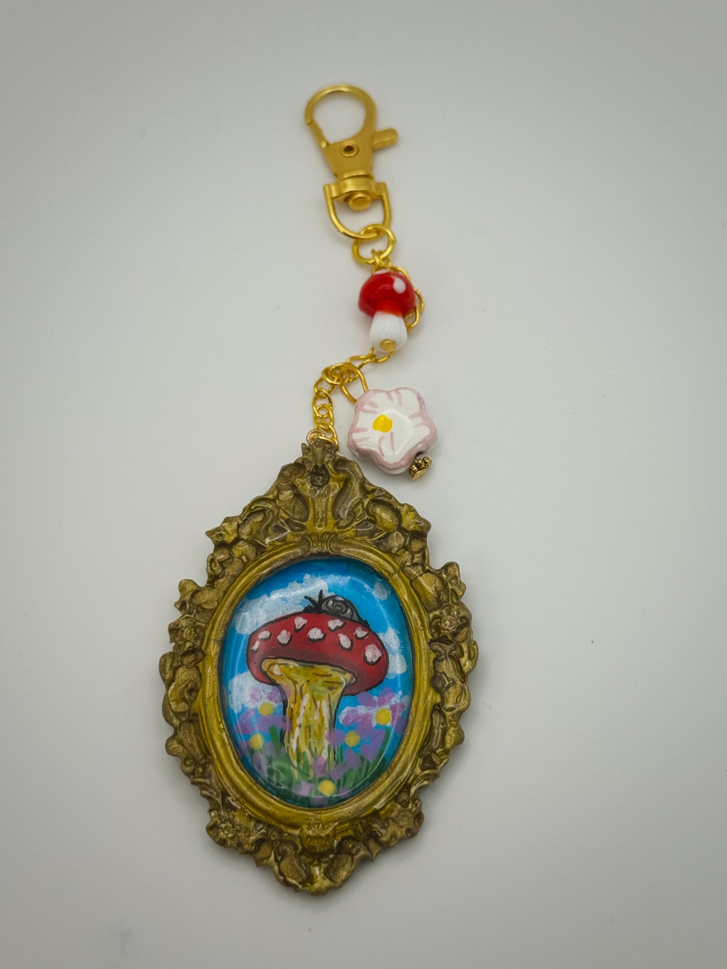 Vintage Frame Snail on Mushroom Keychain – Handmade Polymer Clay Bag Charm