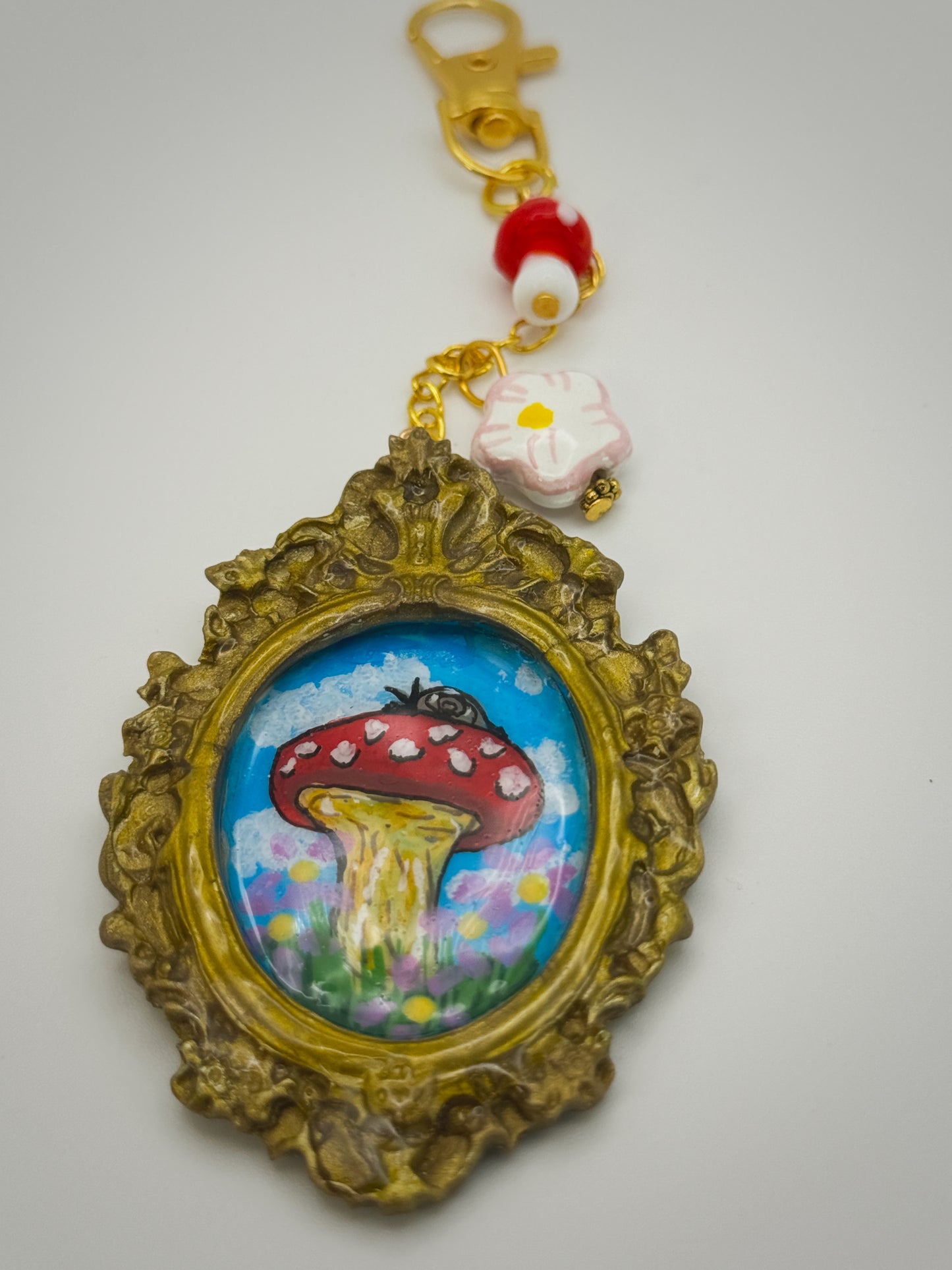 Vintage Frame Snail on Mushroom Keychain – Handmade Polymer Clay Bag Charm