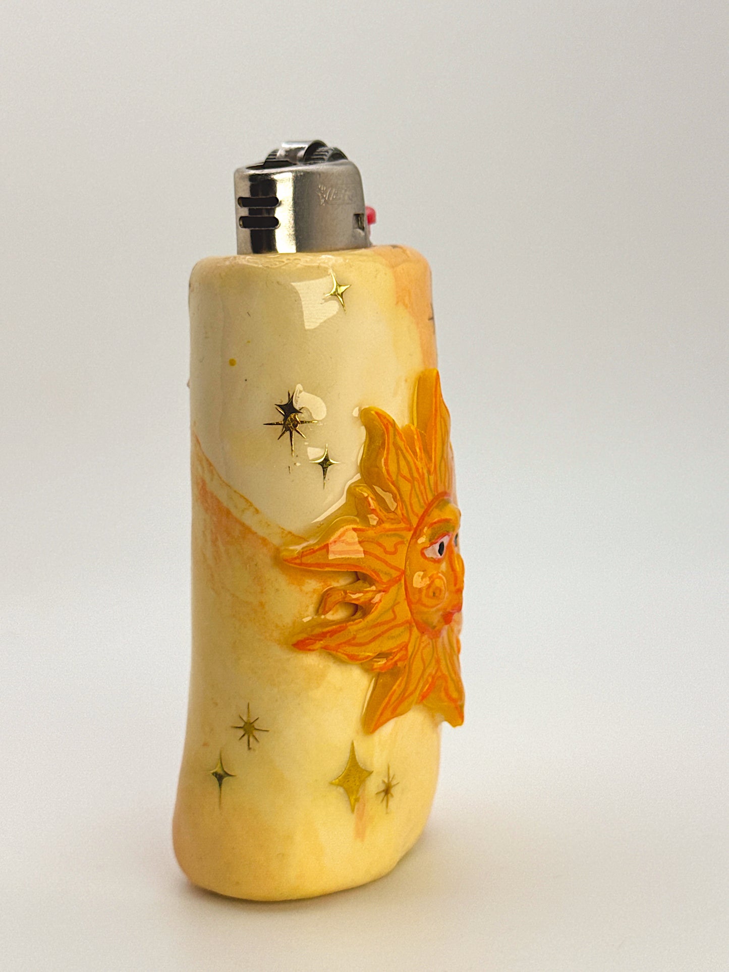 Miss Sunny Celestial Lighter Case – Handcrafted Moon Face Art Lighter Cover